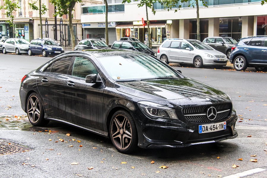 PARIS FRANCE - AUGUST 8 2014: Motor car Mercedes-Benz C117 CLA-class in the city street.