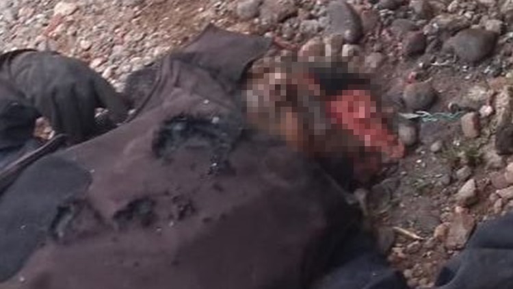 Restos de los policías ejecutados en Aguililla (Fotos: Cuartoscuro)