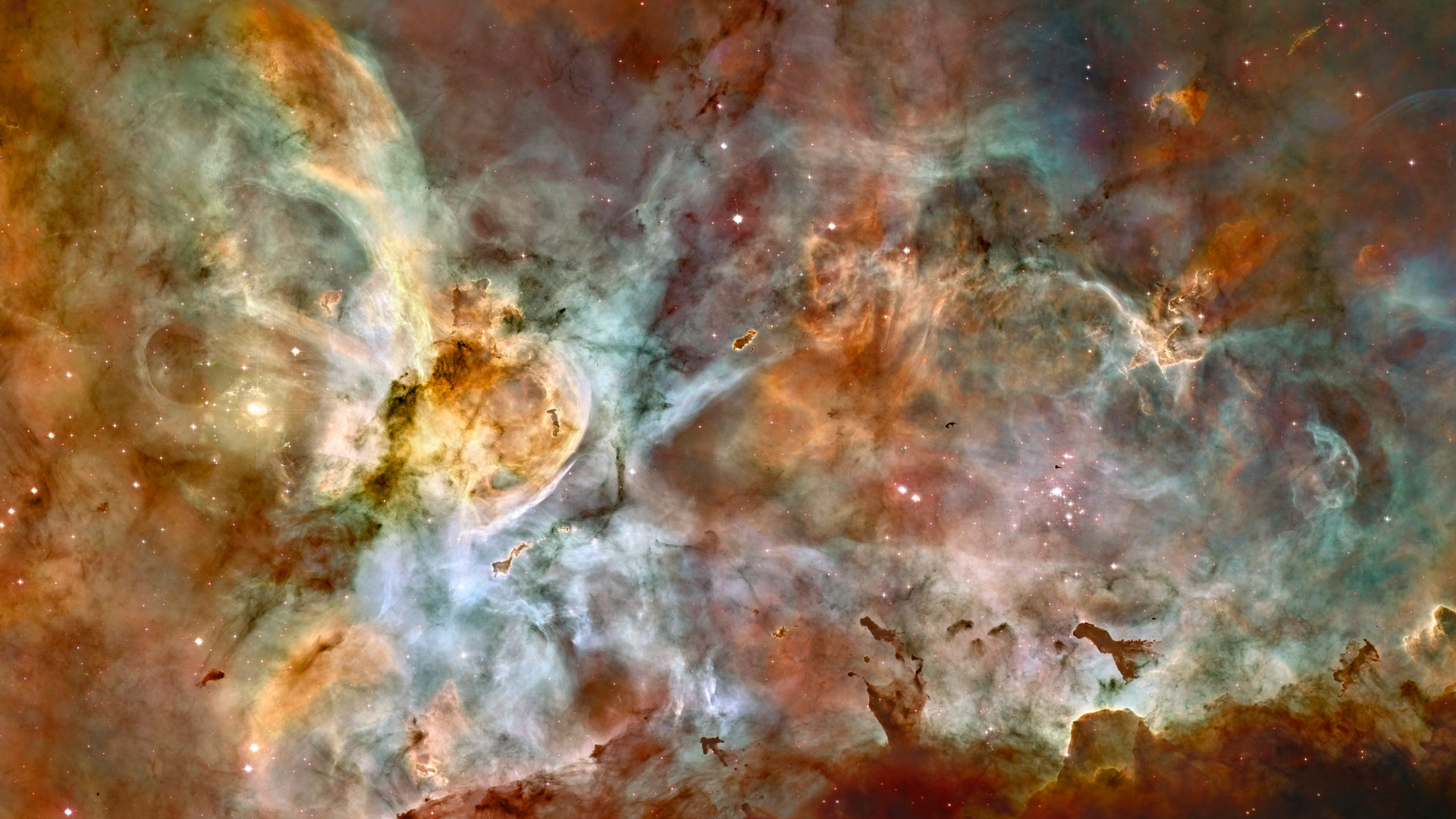 El Telescopio Espacial Hubble capturó esta vista de 50 años-luz de ancho de la región central de la Nebulosa Carina, donde se está produciendo una vorágine de nacimiento -y muerte- de estrellas