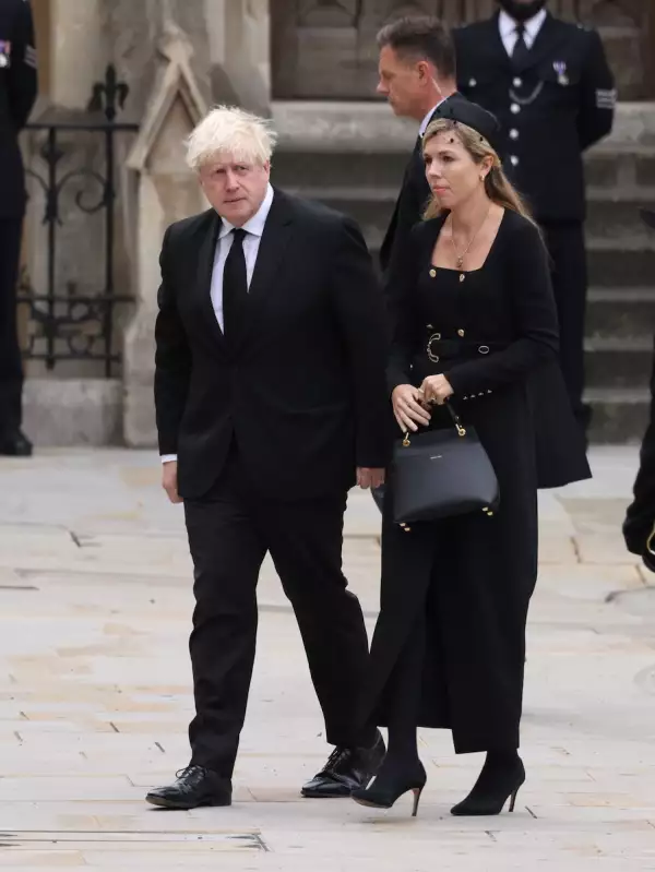 Boris Johnson y su esposa en el funeral de la reina Isabel II